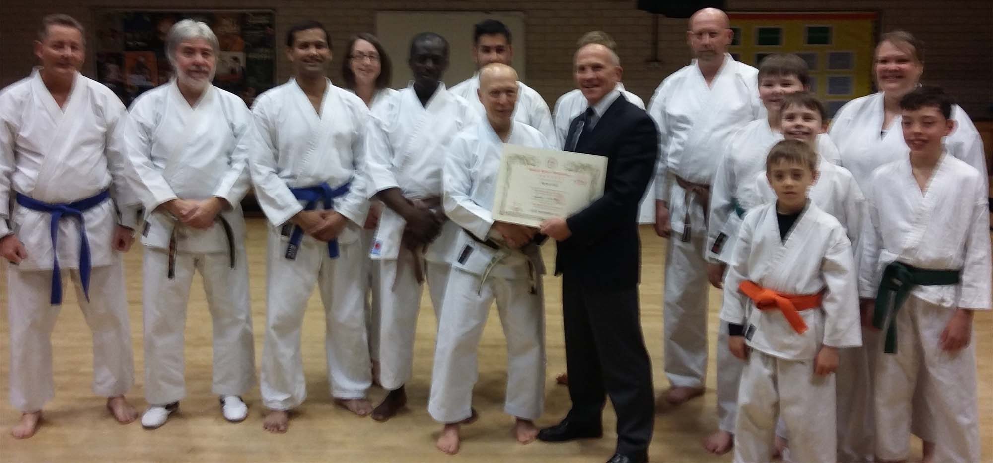 Sensei Rob Sills awarded 5th Dan grading by Brian Seabright of BKA